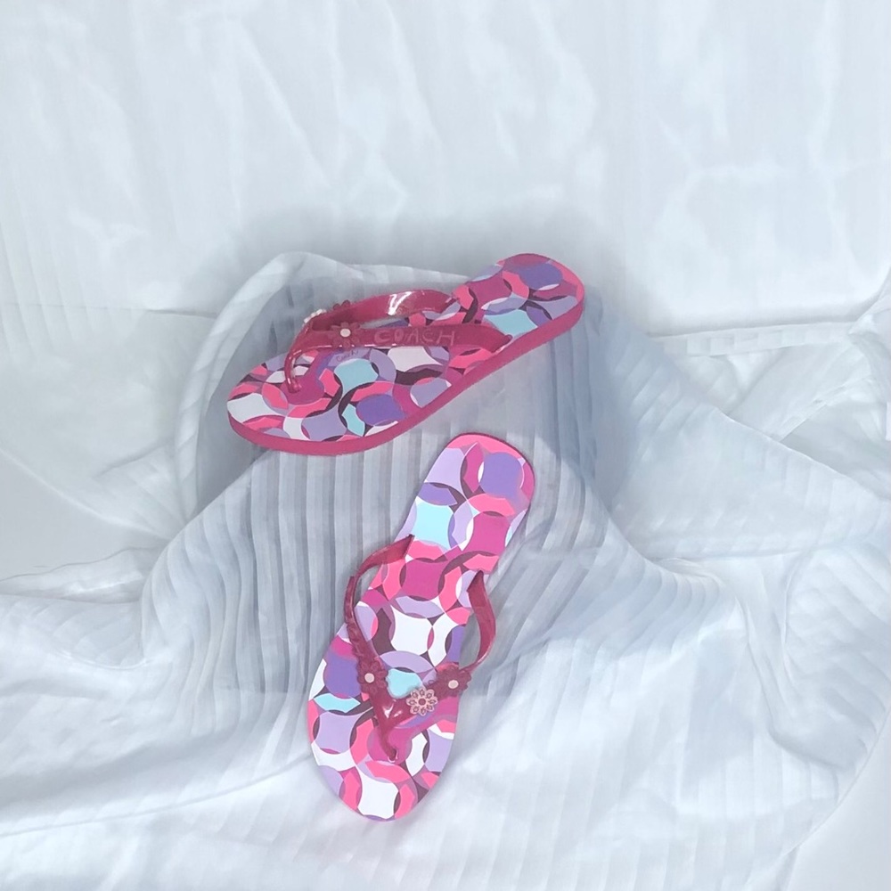 Coach flip flops.  Size 9